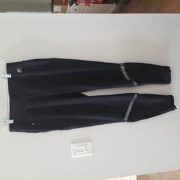 Fila Women's sport leggings with reflector strips zippers at bottom - Picture 1 of 7
